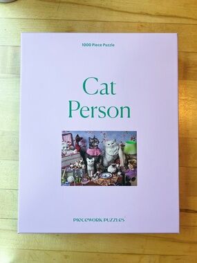 Piecework Puzzles Cat Person 1000 piece puzzle